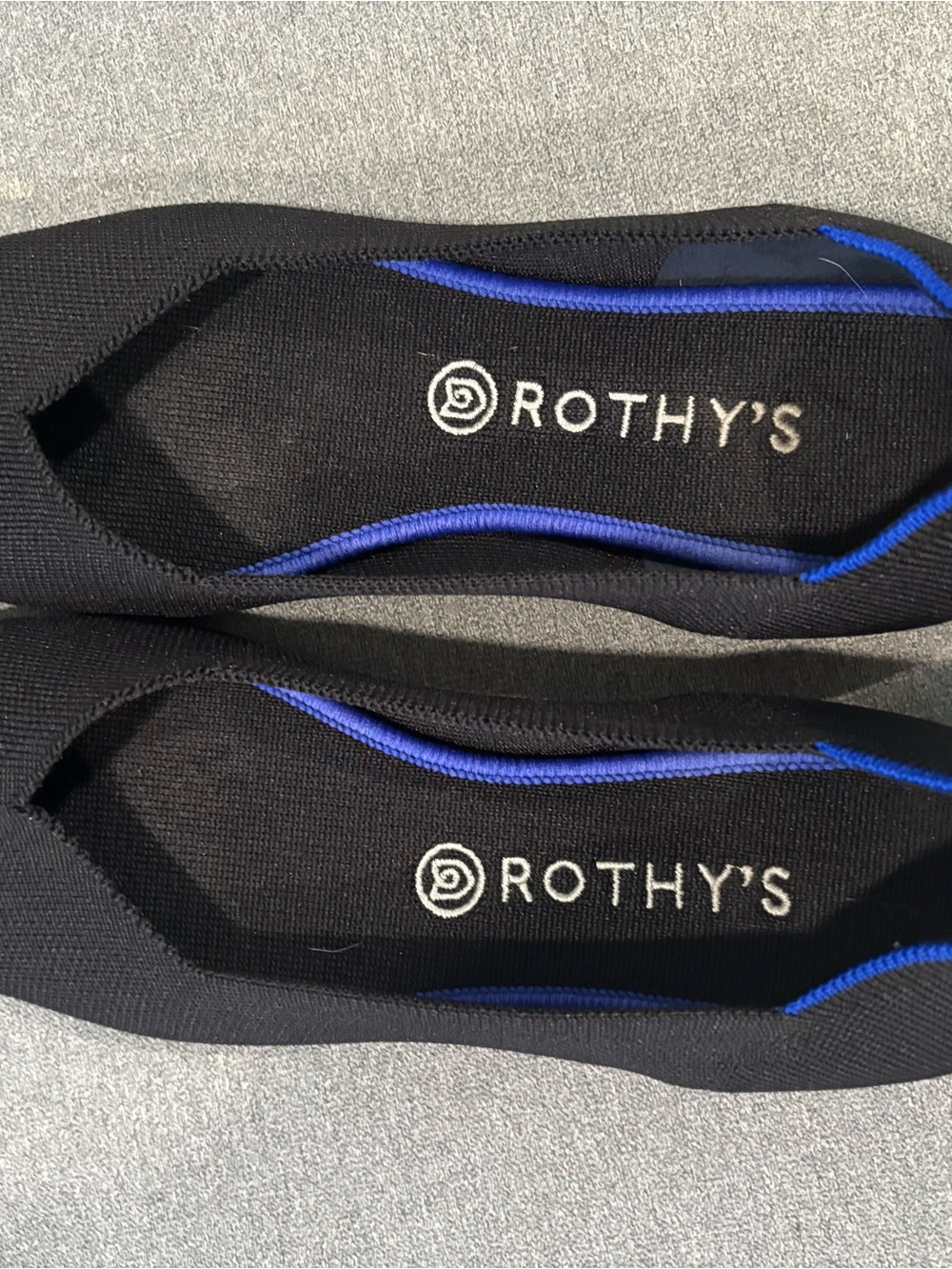Rothy's Black Flats with Royal Blue Piping